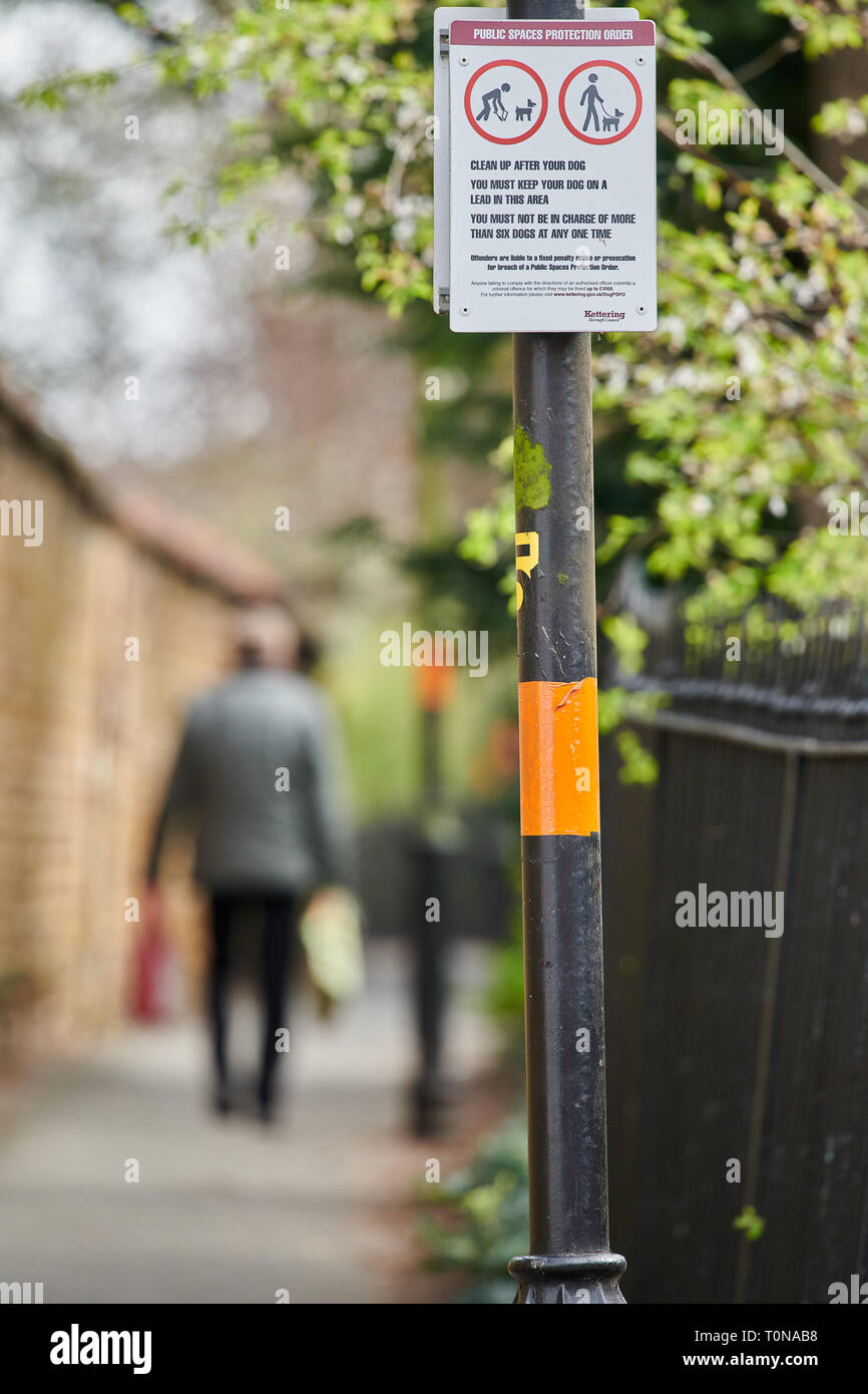 Signs advising dog walkers that the area is a public space under a protection order. Stock Photo