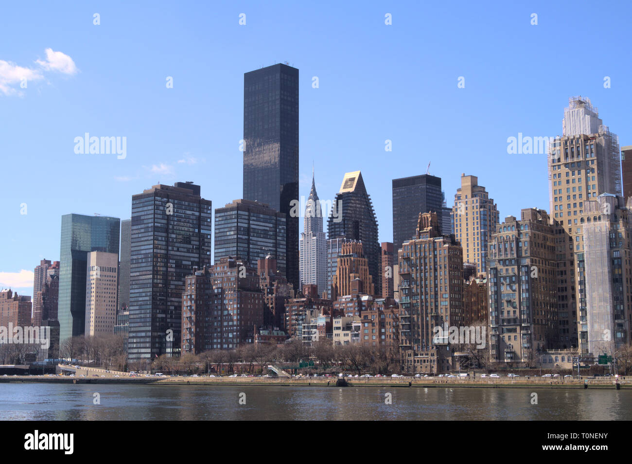 Chrysler Building seen amongst Manhattan Skyline from Roosevelt Island, New York City, New York Stock Photo