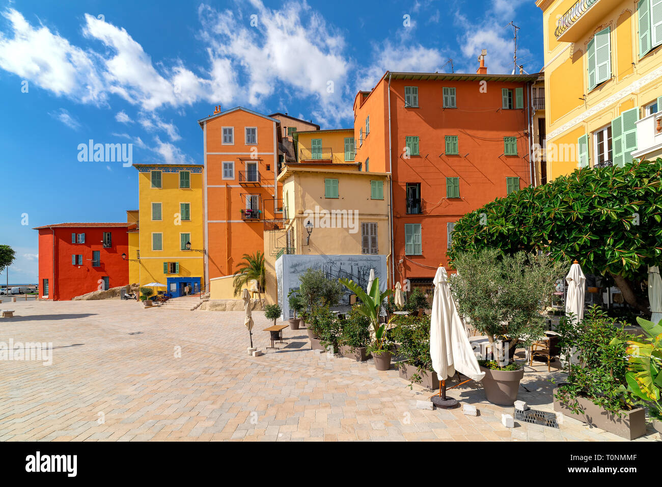 Town square and colorful houses in Menton, France. Stock Photo