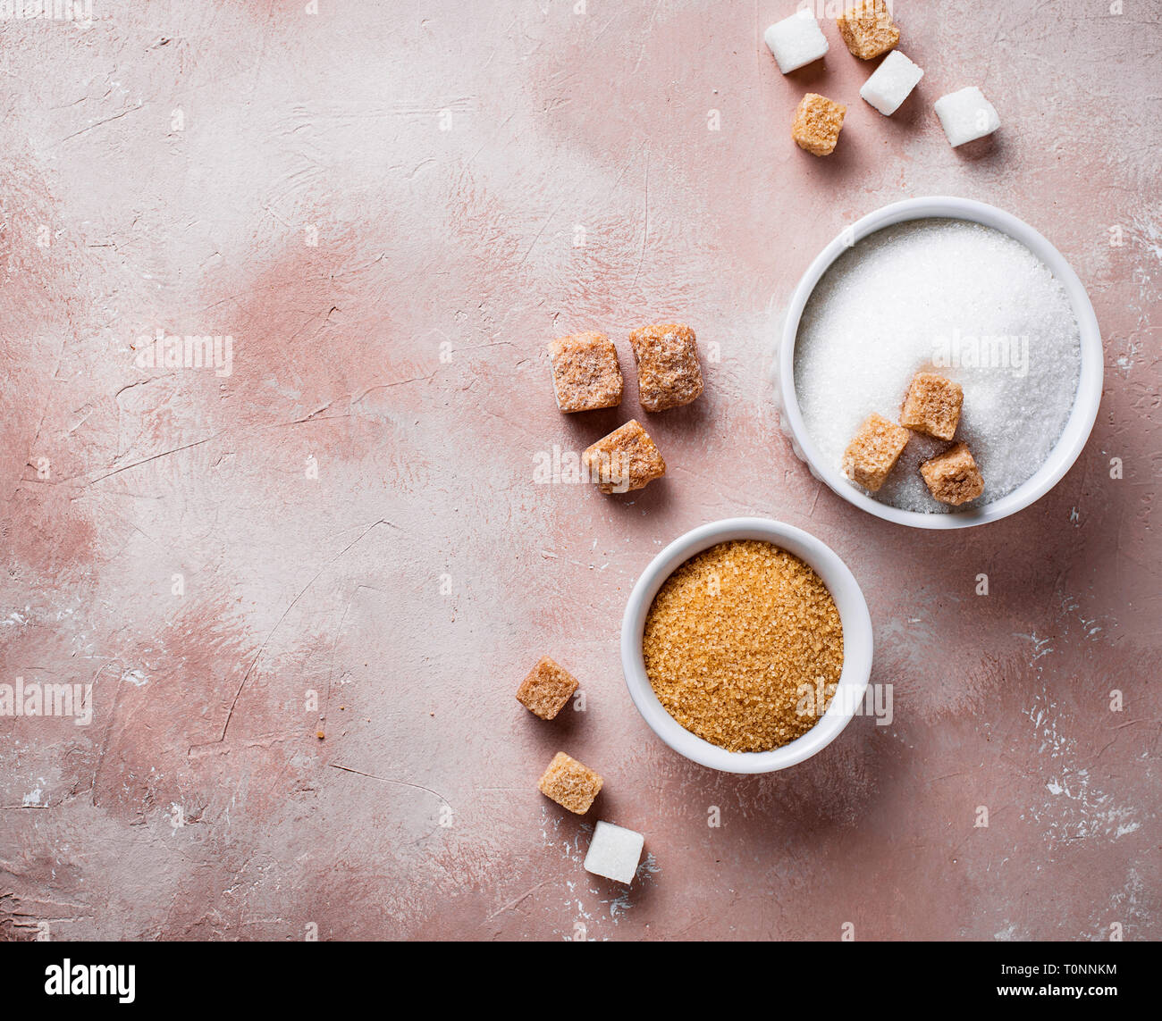 White and brown cane sugar Stock Photo Alamy