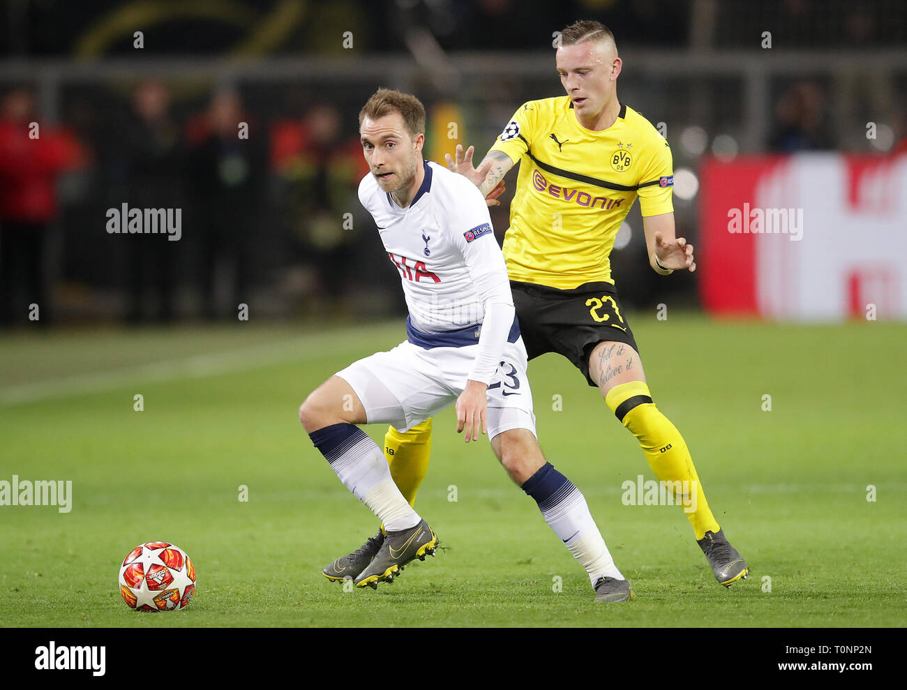 Tottenham Hotspur's Christian Eriksen (left) and Borussia Dortmund's Marius Wolf battle for the ball Stock Photo