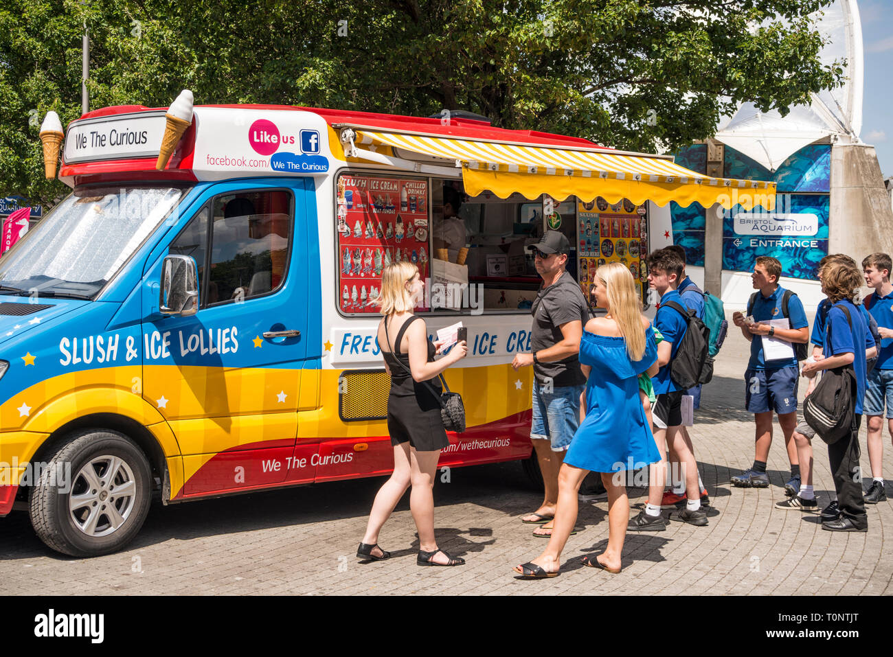 People queueing for ice cream on hot summer day, Bristol, UK Stock Photo