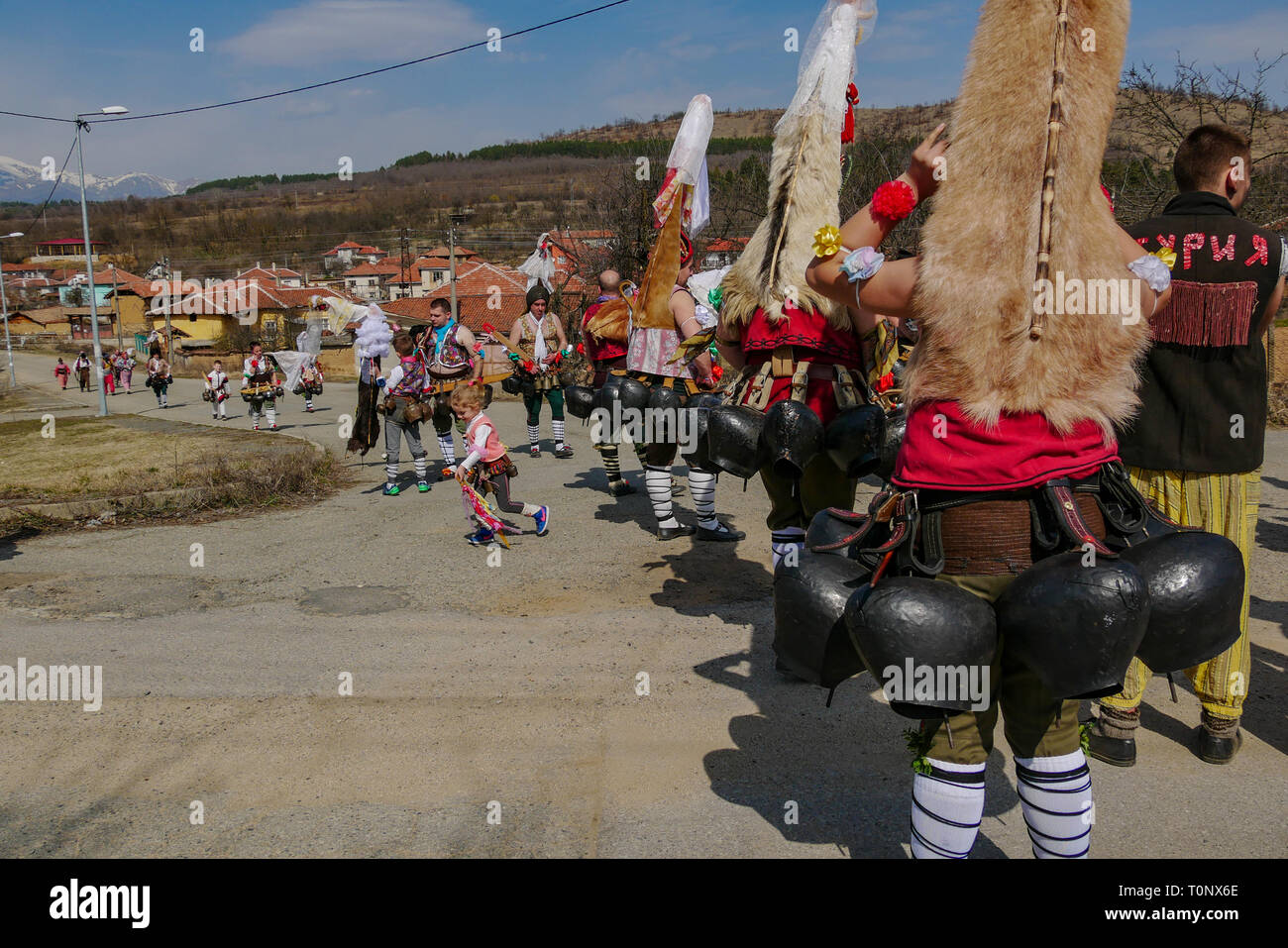 Turia, Bulgaria 9 March 2019 For centuries, spring has been performing a removed evil. People in the village wear big bells and terrible costumes. The Stock Photo