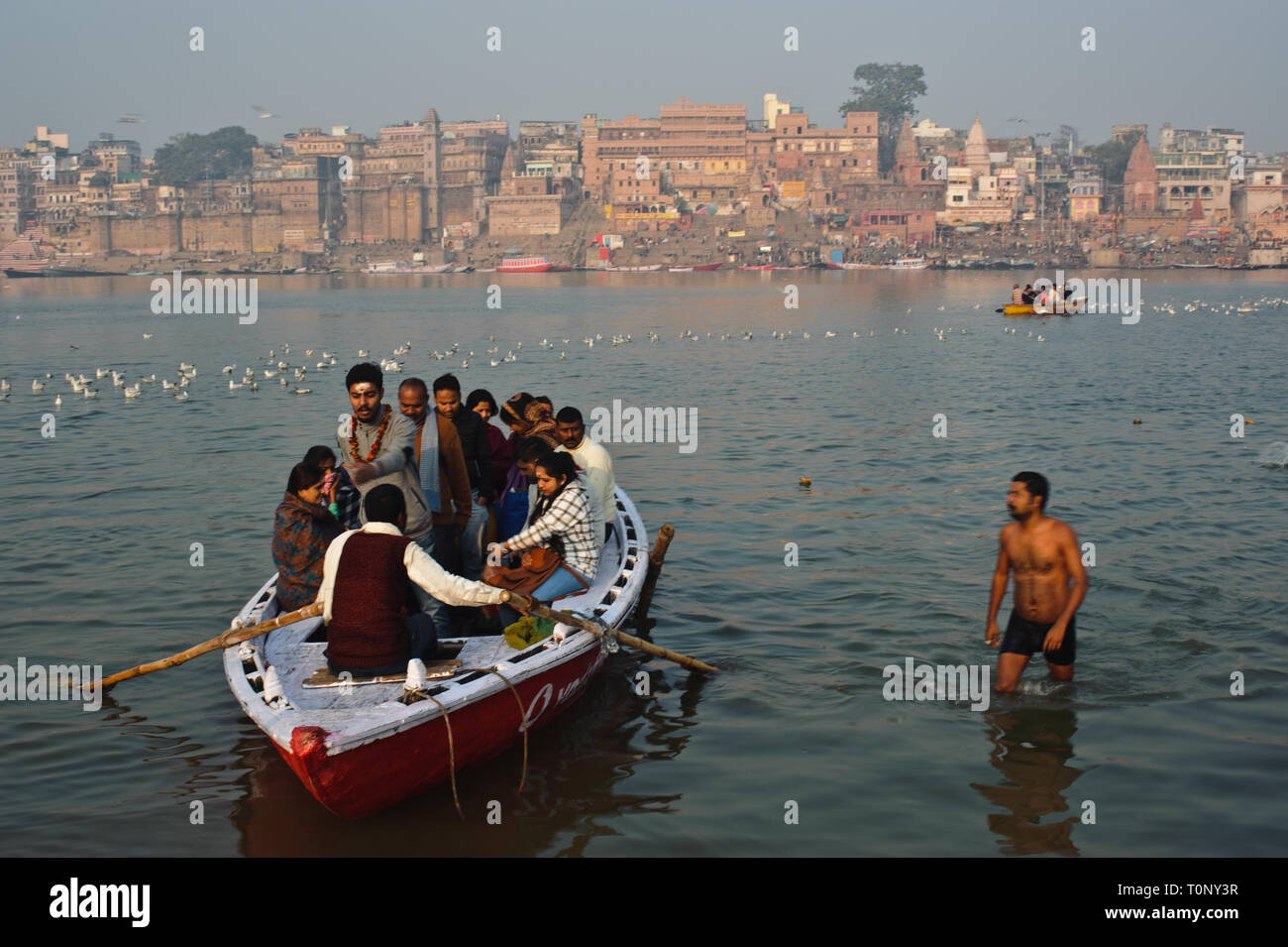 Indian tourists boating on the Ganges river ( India) Stock Photo