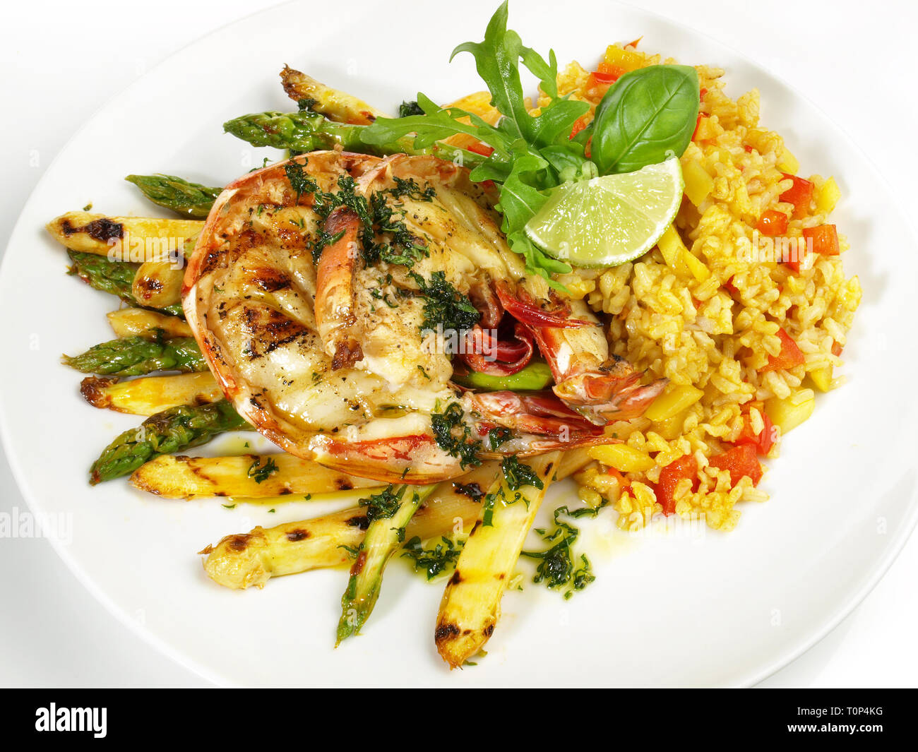 Grilled King Prawn - Tiger Prawn with Rice and Asparagus on white Background Stock Photo