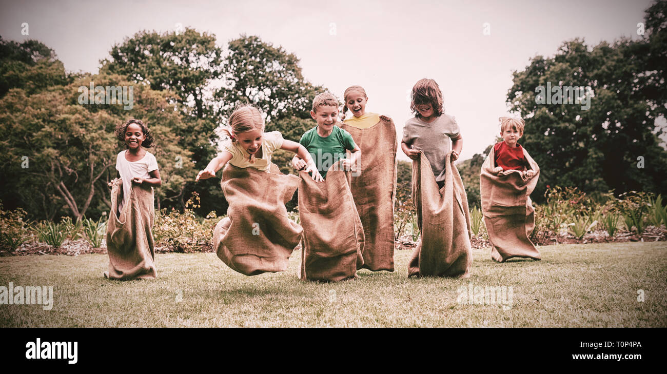 https://c8.alamy.com/comp/T0P4PA/children-having-sack-race-T0P4PA.jpg