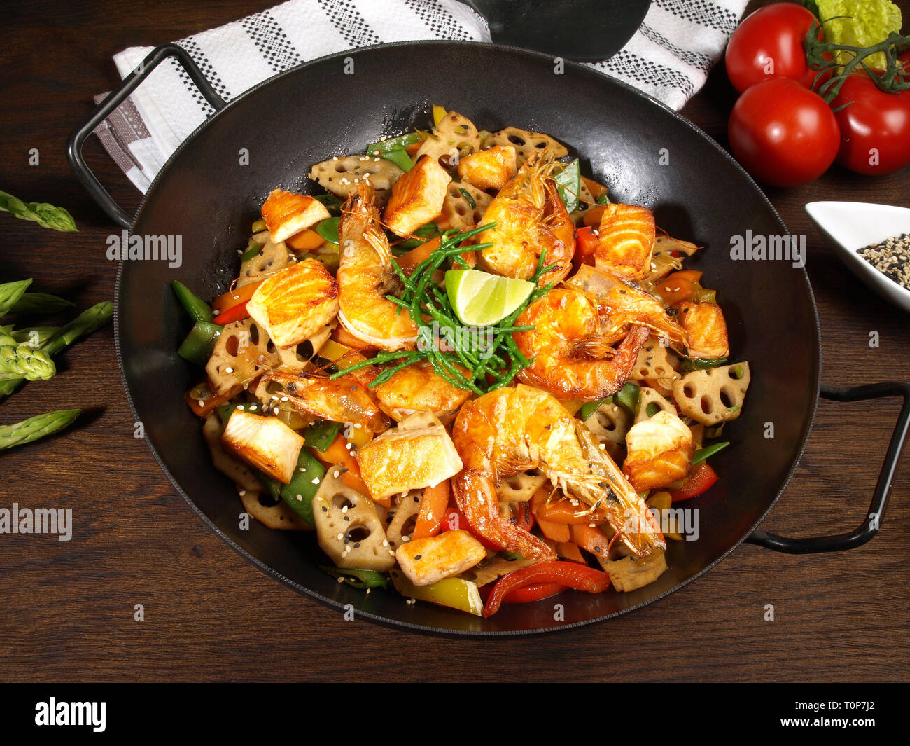 Wok with Shrimp, Salmon and Noodles Stock Photo Alamy