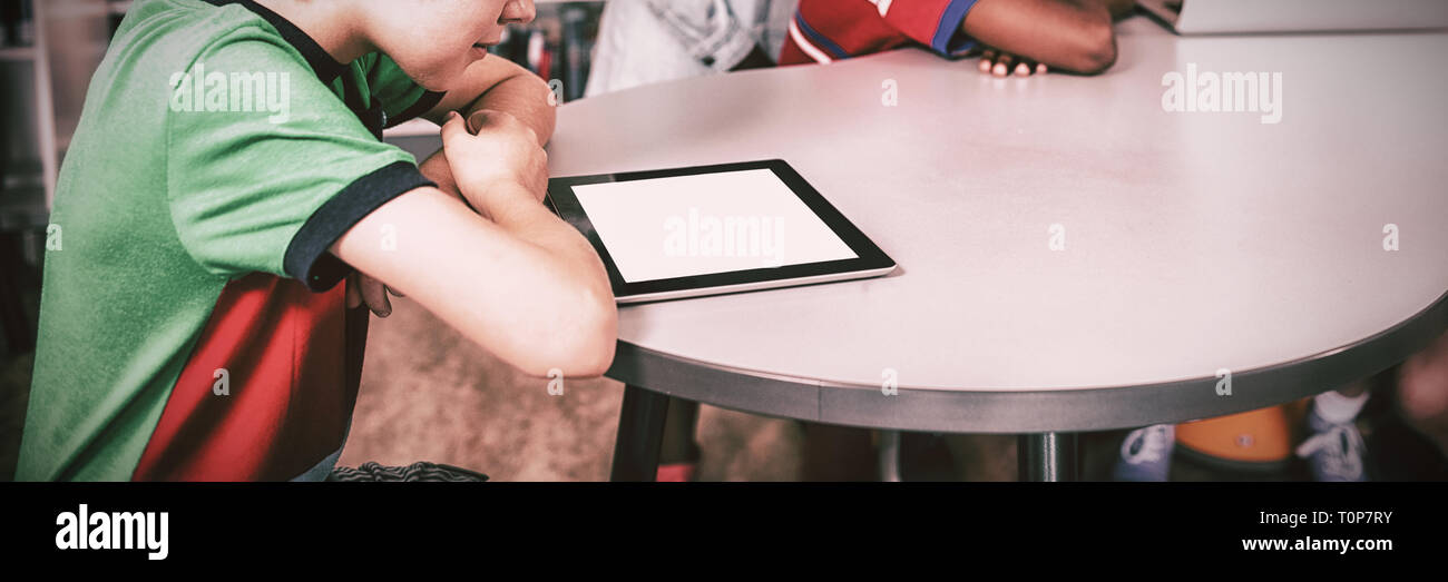 Pupils using technology Stock Photo