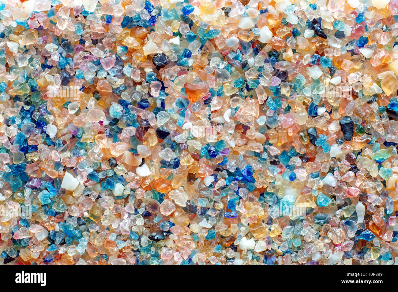 Small shiny colorful stones as a background pattern Stock Photo