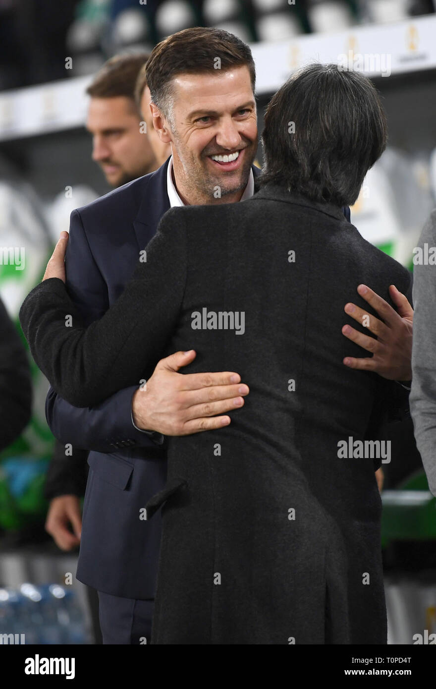 20 March 2019, Lower Saxony, Wolfsburg: Soccer: International match, Germany - Serbia in the Volkswagen Arena. Serbia coach Mladen Krstajic (l) welcomes national coach Joachim Löw before the match. Photo: Peter Steffen/dpa Stock Photo