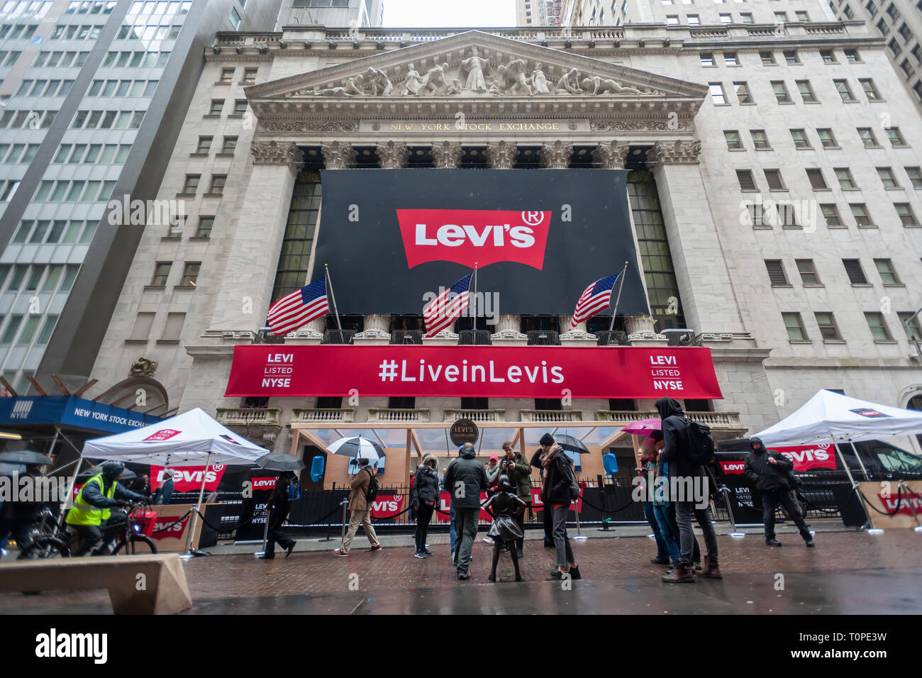 Lower Manhattan, New York, USA. 21st Mar 2019. The New York Stock Exchange  in Lower Manhattan is decorated for the first day of trading for the Levi  Strauss & Co. initial public