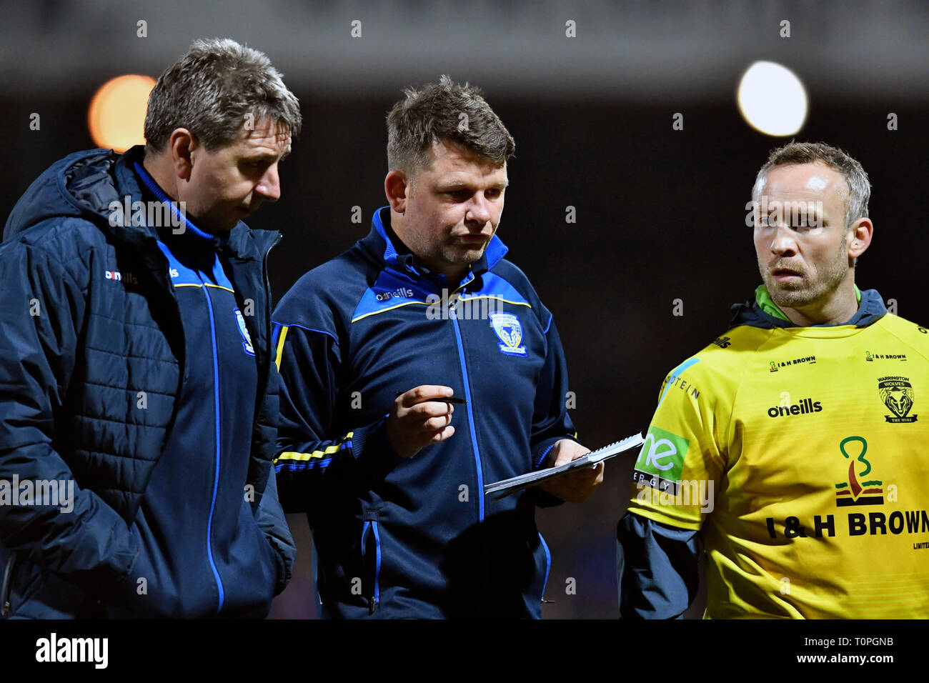 Mobile Rocket Stadium, Wakefield, UK. 21st Mar, 2019. Betfred Super League rugby, Wakefield Trinity versus Warrington Wolves; Lee Briers, Assistant Coach of Warrington Wolves discusses tactics with Head Coach Steve Price and Assistant Coach Andrew Henderson as they leave the pitch in deep conversation at half time Credit: Action Plus Sports/Alamy Live News Stock Photo