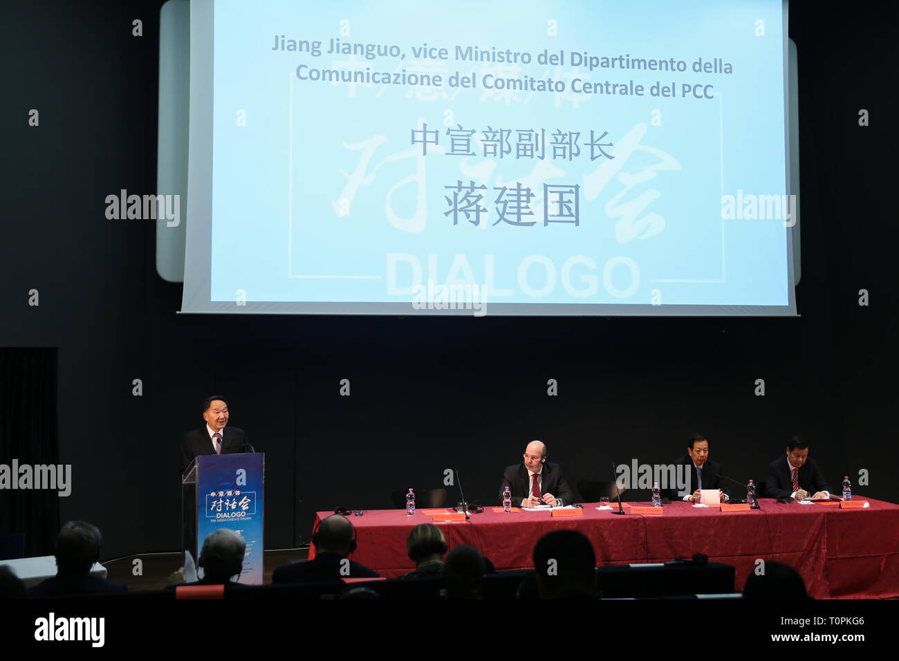 (190322) -- ROME, March 22, 2019 (Xinhua) -- Jiang Jianguo (L), deputy head of the Publicity Department of the Communist Party of China Central Committee, delivers a speech at a dialogue in Rome, Italy, March 20, 2019. Representatives of leading Chinese and Italian media pledged on Wednesday here to renew and expand collaboration to facilitate mutual understanding between the peoples and to promote bilateral ties. On the eve of Chinese President Xi Jinping's state visit to Italy, some 200 government officials, media executives, reporters and experts of the two countries participated in a di Stock Photo
