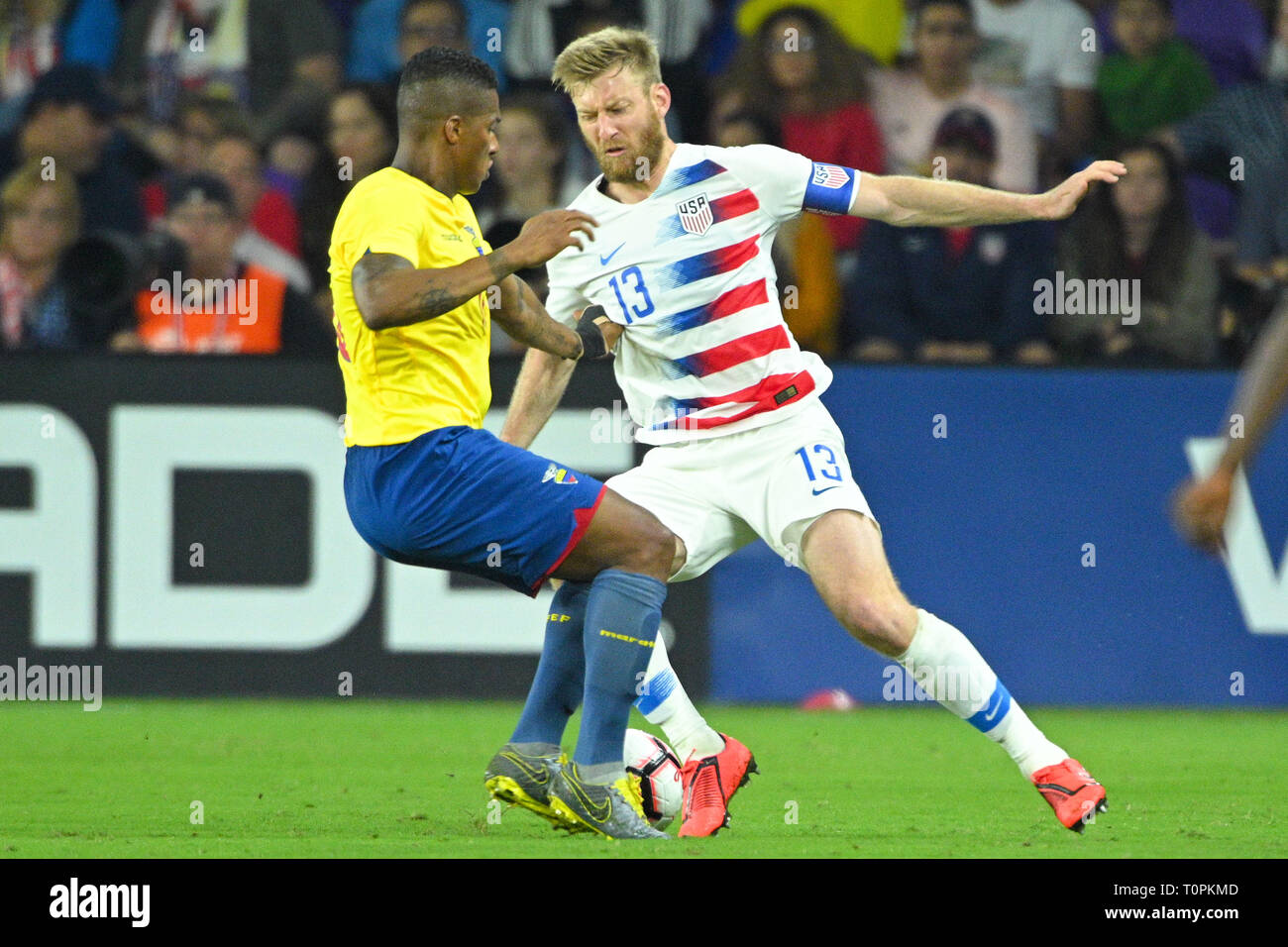 Orlando, Florida, USA. 21st Mar, 2019. US defender Tim Ream (13) and Ecuador midfielder Antonio Valencia (16) during an international friendly between the US and Ecuador at Orlando City Stadium on March 21, 2019 in Orlando, Florida. The US won the game 1-0. © 2019 Scott A. Miller. Credit: Scott A. Miller/ZUMA Wire/Alamy Live News Stock Photo