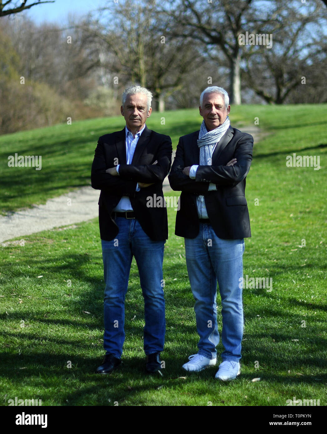 Gelsenkirchen, Germany. 21st Mar, 2019. Erwin (r) and Helmut Kremers are standing on the grounds of the golf club Haus Leythe. The football twins Kremers celebrate their 70th birthday on 24 March 2019. (to dpa popstars of football: The indomitable Kremers twins turn 70 from 22.03.2019) Credit: Ina Fassbender/dpa/Alamy Live News Stock Photo