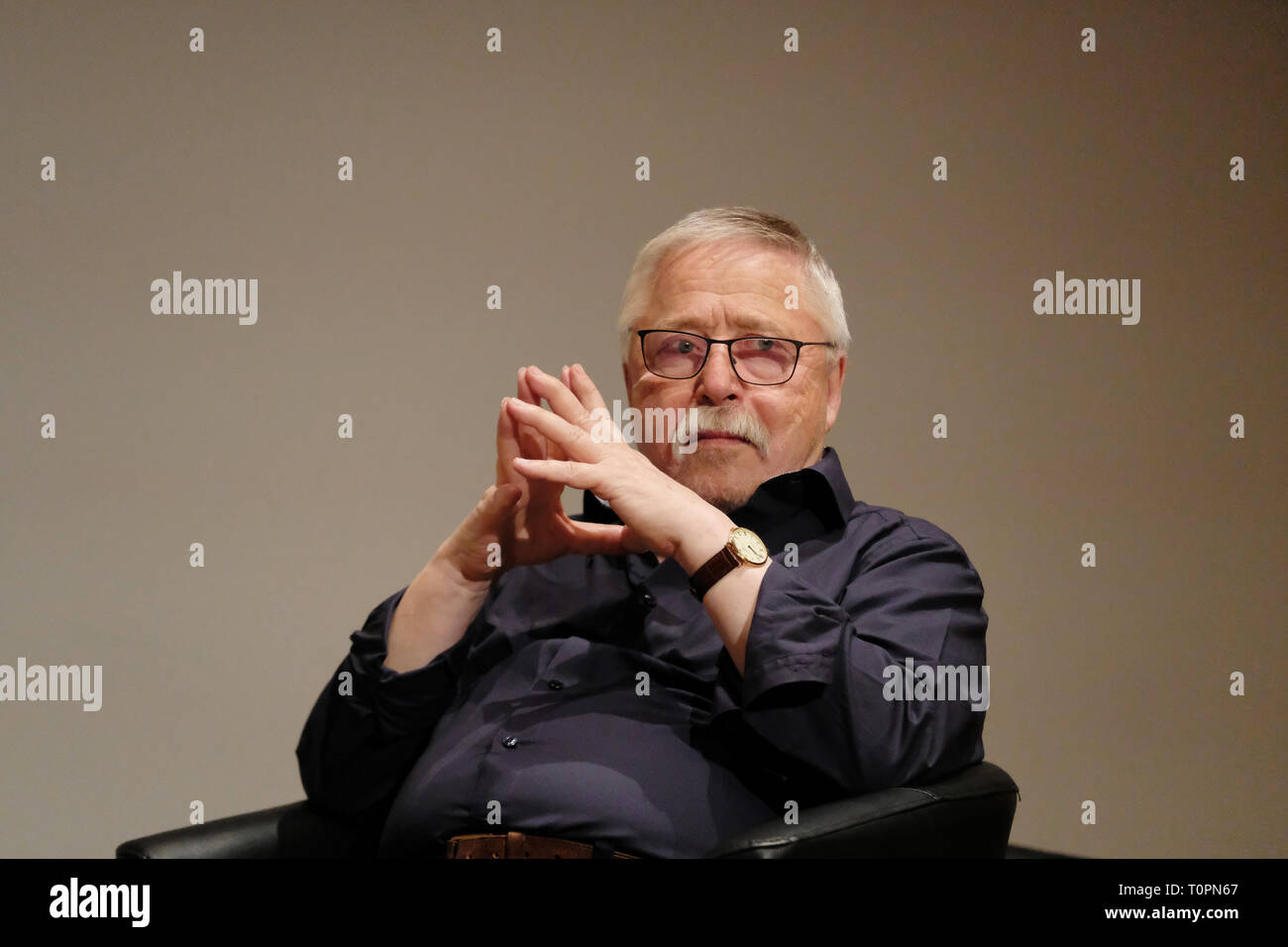 Leipzig, Germany. 21st Mar, 2019. Liedermacher und Lyriker Wolf Biermann sits on a stage in the Kongresshalle for an evening of the event series 'Leipzig reads', which takes place parallel to the book fair. Credit: Sebastian Willnow/dpa-Zentralbild/dpa/Alamy Live News Stock Photo