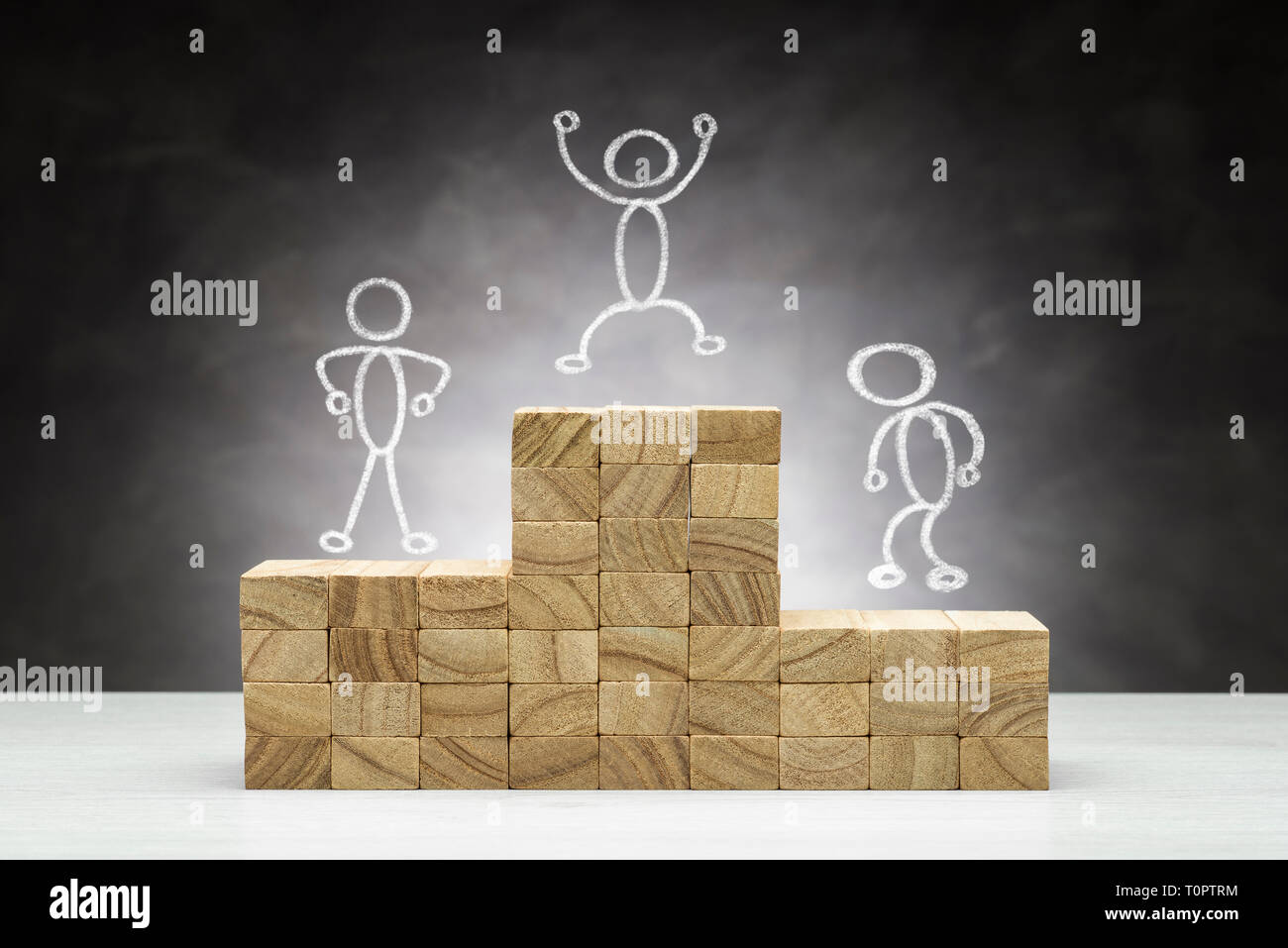 Concept of competition. Wooden podium on grey background with people shapes. Stock Photo