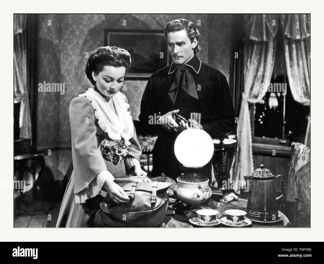1941 black-and-white American western film from Warner Bros. Pictures, produced by Hal B. Wallis and Robert Fellows, directed by Raoul Walsh, that stars Errol Flynn and Olivia de Havilland.  The film's storyline offers a highly fictionalized account of the life of Gen. George Armstrong Custer, from the time he enters West Point military academy through the American Civil War and finally to his death at the Battle of the Little Bighorn. Custer is portrayed as a fun-loving, dashing figure who chooses honor and glory over money and corruption. The battle against Chief Crazy Horse is portrayed as  Stock Photo