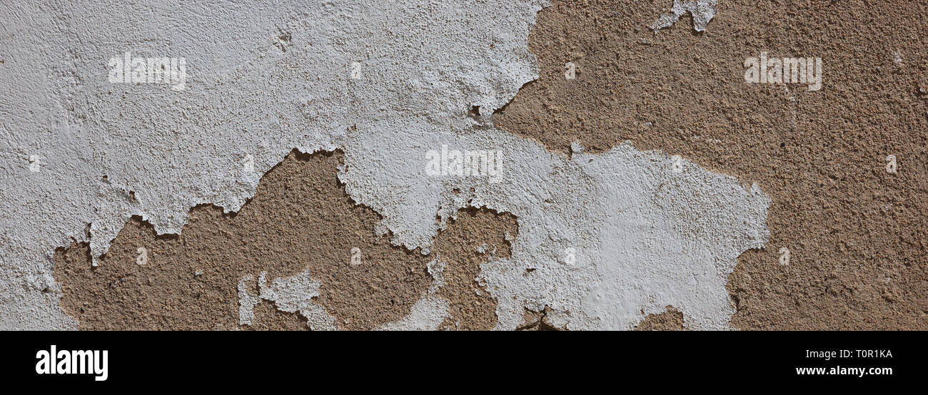 Plastered peeled wall texture background, beige brown color, banner Stock Photo