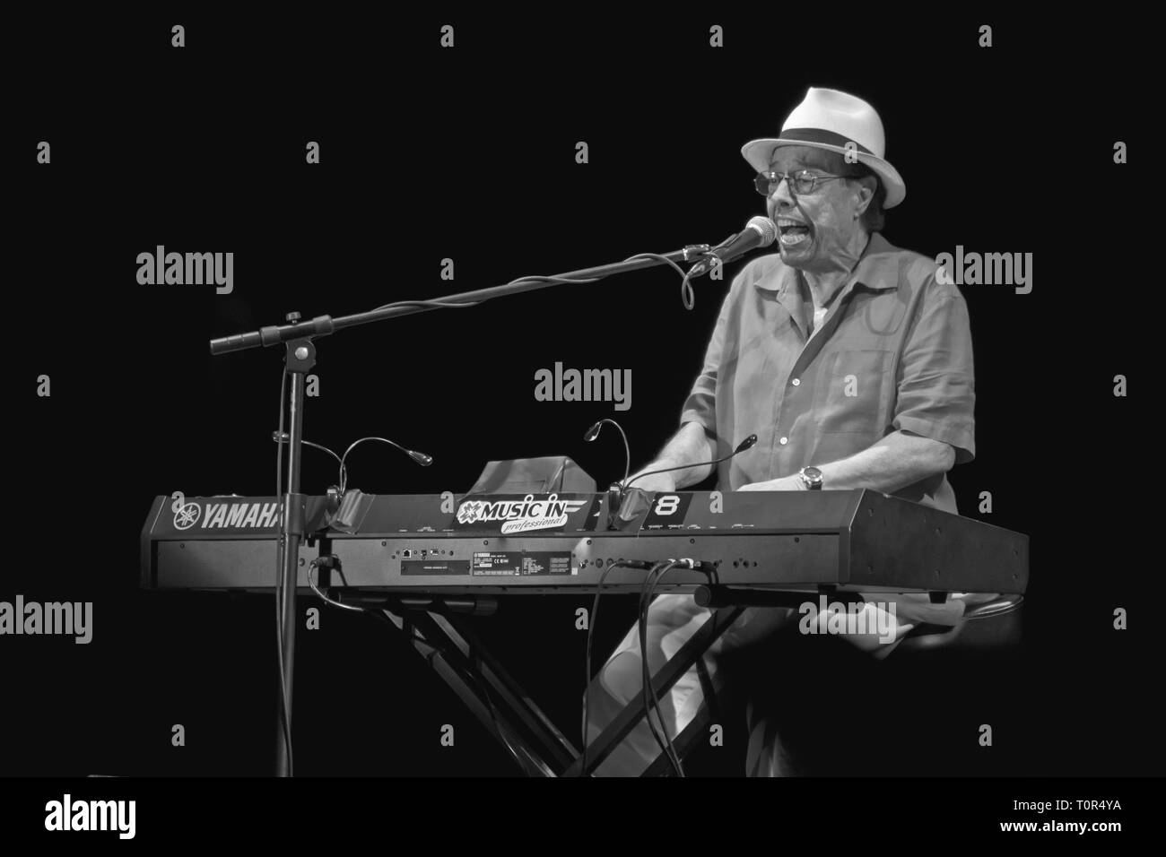 PERUGIA, ITALY - JULY 14, 2011 - Sergio Mendes playing keyboards on main stage at Umbria Jazz Festival - July 14, 2011 in Perugia, Italy Stock Photo