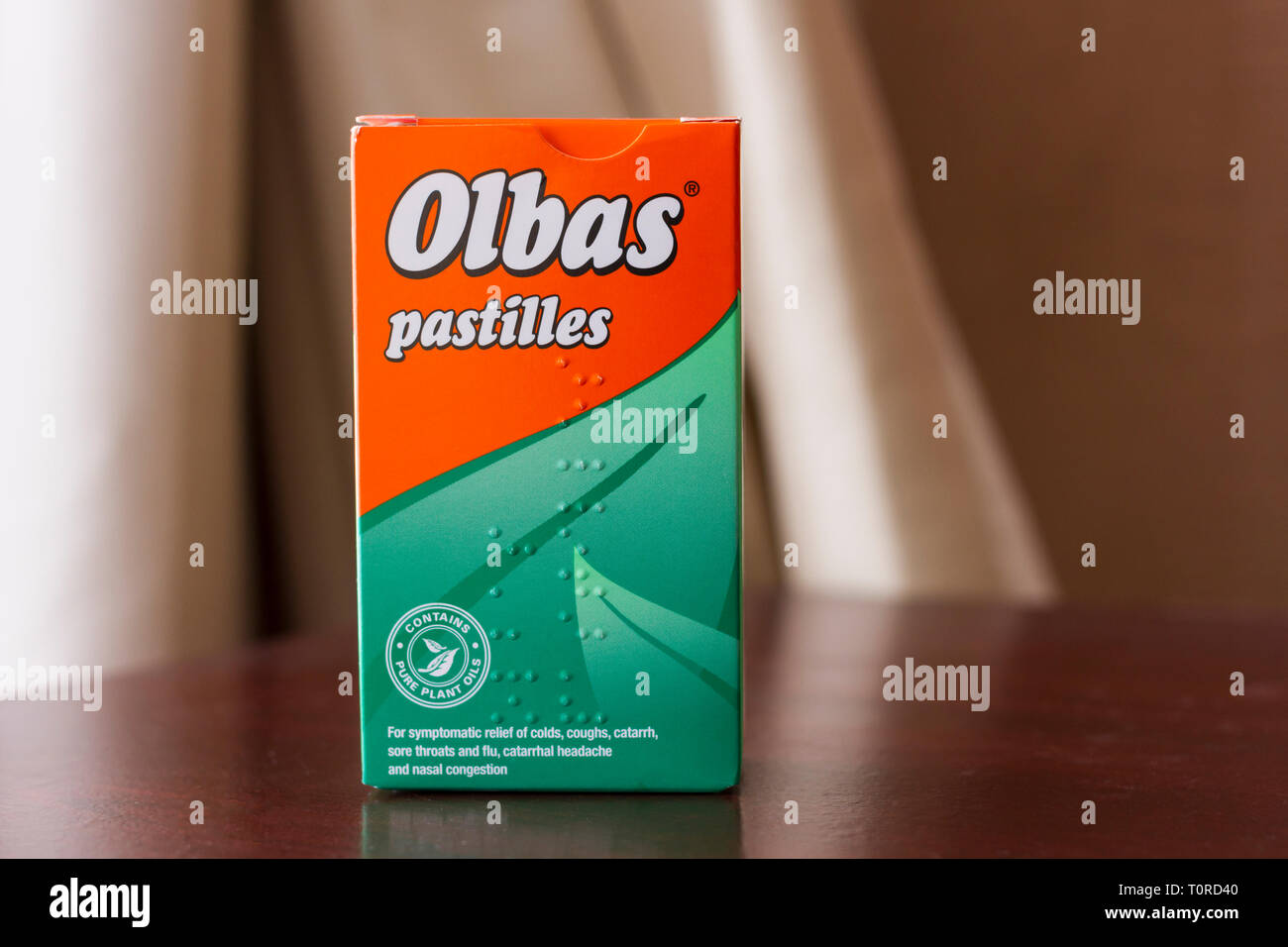 Box of Olbas pastilles for sore throats, coughs, colds and nasal congestion. United Kingdom Stock Photo
