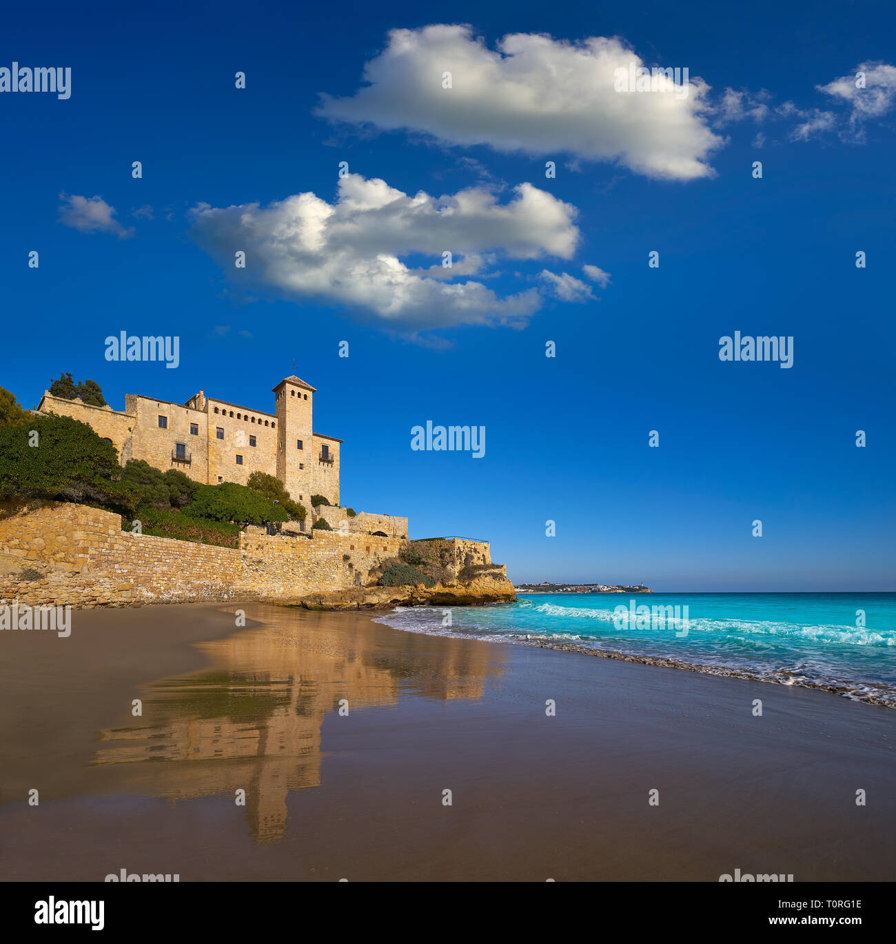 Cala La Jovera beach under Tamarit castle in Tarragona of Catalonia Stock Photo