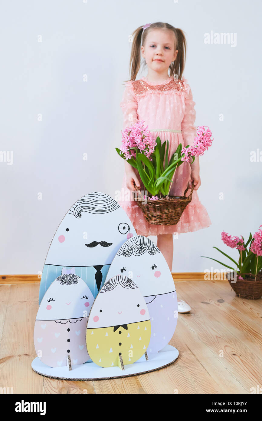 Easter 2019 Beautiful little girl in a dress with Easter decorations ...