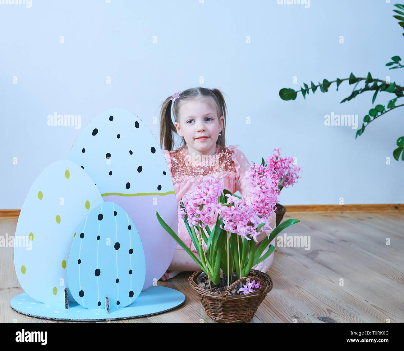 Easter 2019 Beautiful little girl in a dress with Easter decorations ...