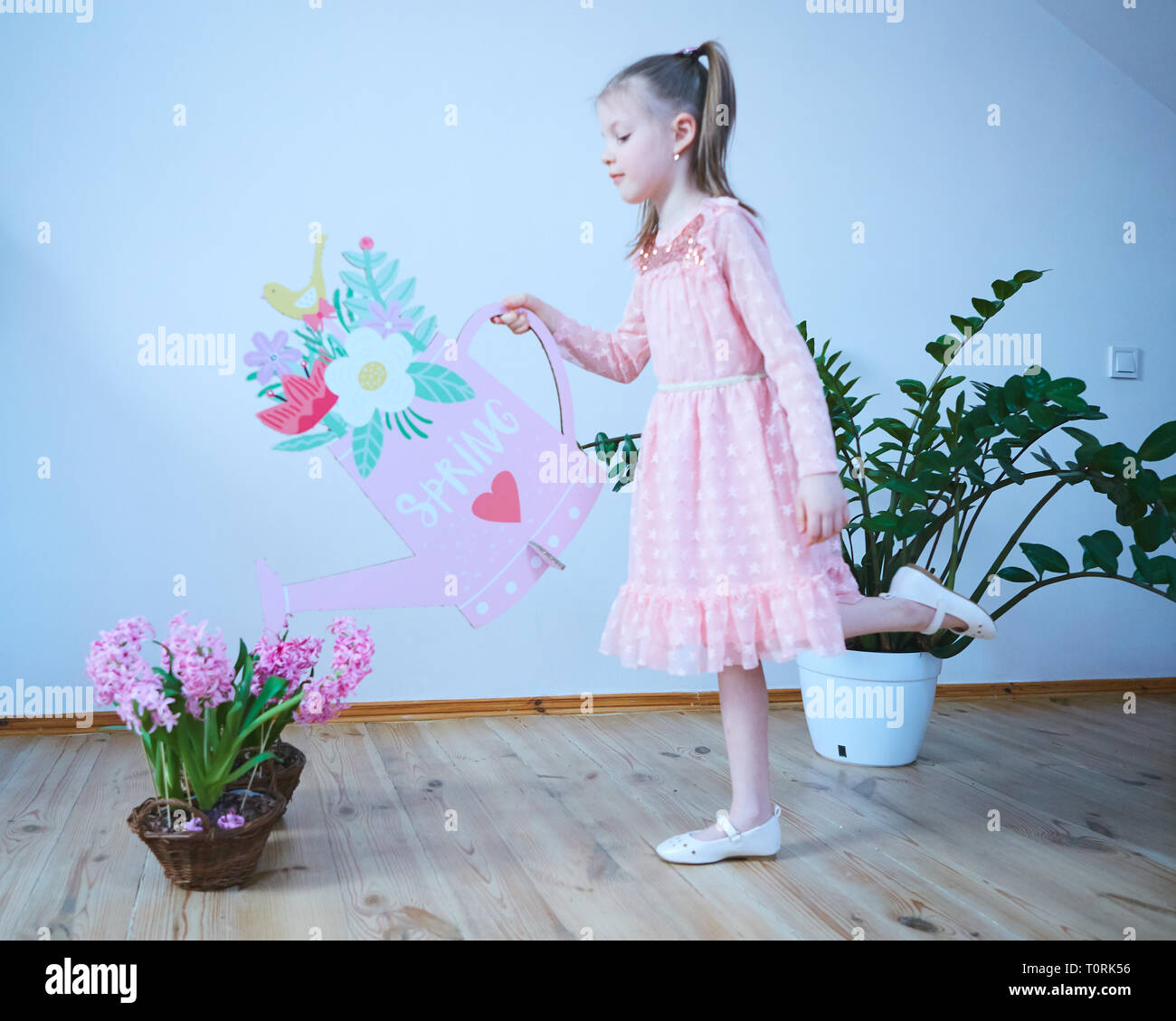 Easter 2019 Beautiful little girl in a dress with Easter decorations ...