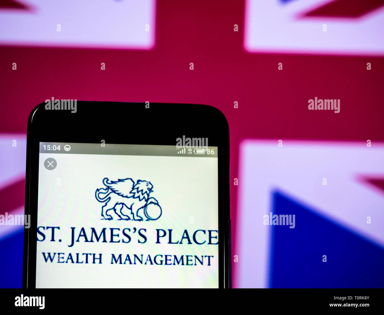 St. James's Place plc logo seen displayed on smart phone Stock Photo
