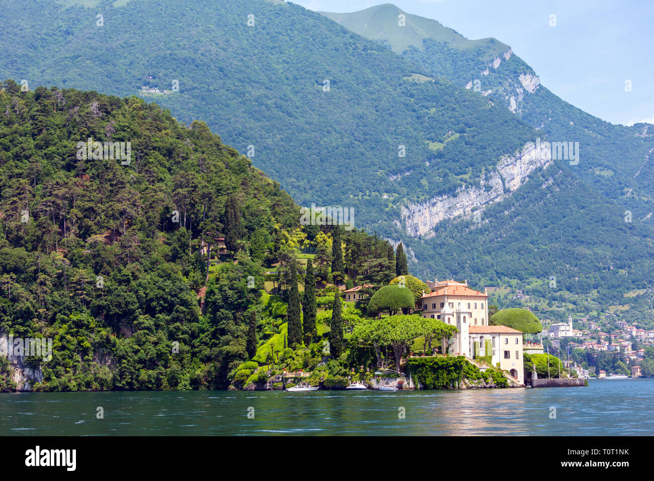 Lake Como, Italy - June 15, 2012: Summer lake shore view from ship board. Villa del Balbianello. Stock Photo