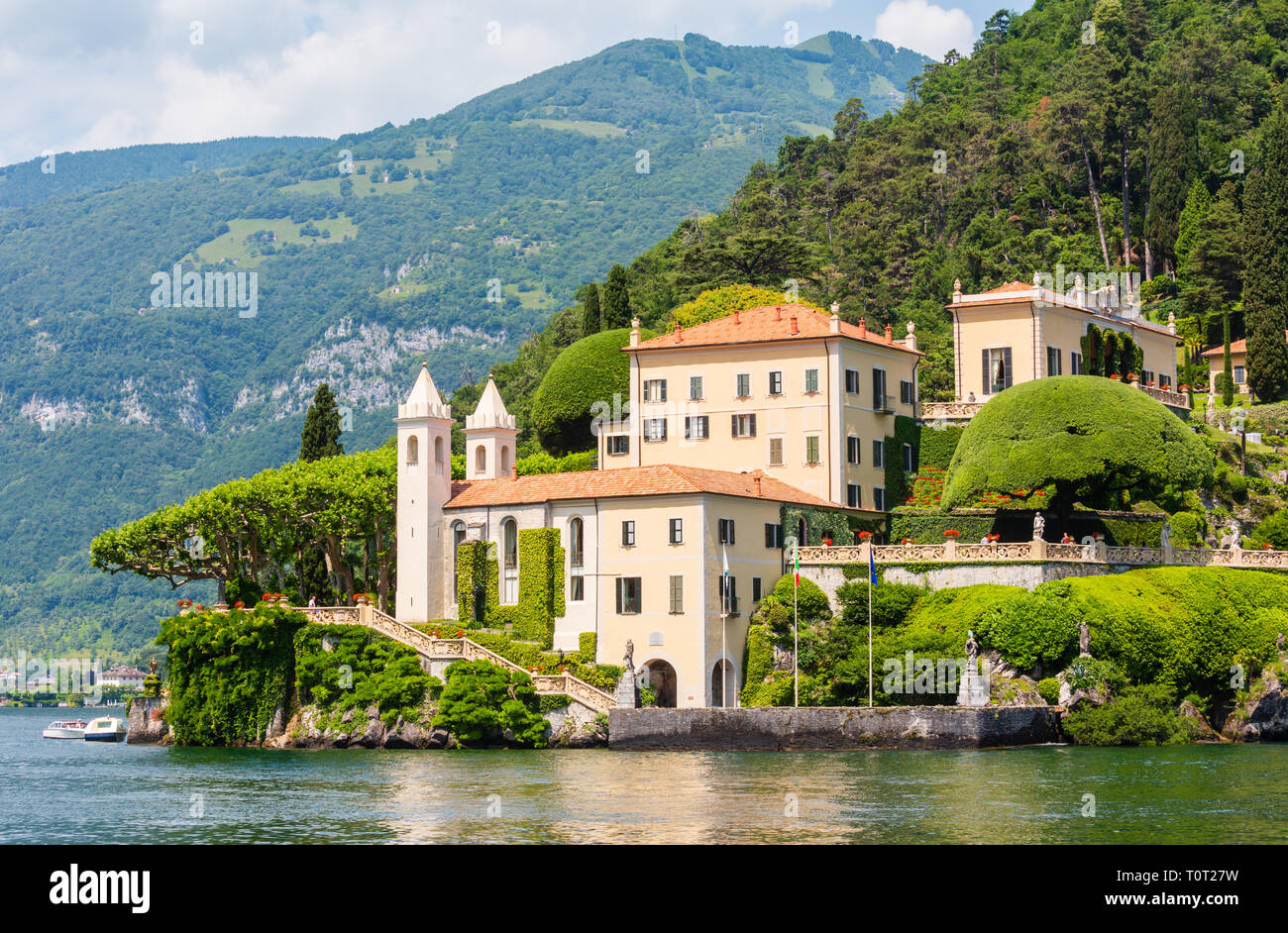 Lake Como, Italy - June 15, 2012: Summer lake shore view from ship board. Villa del Balbianello. Stock Photo