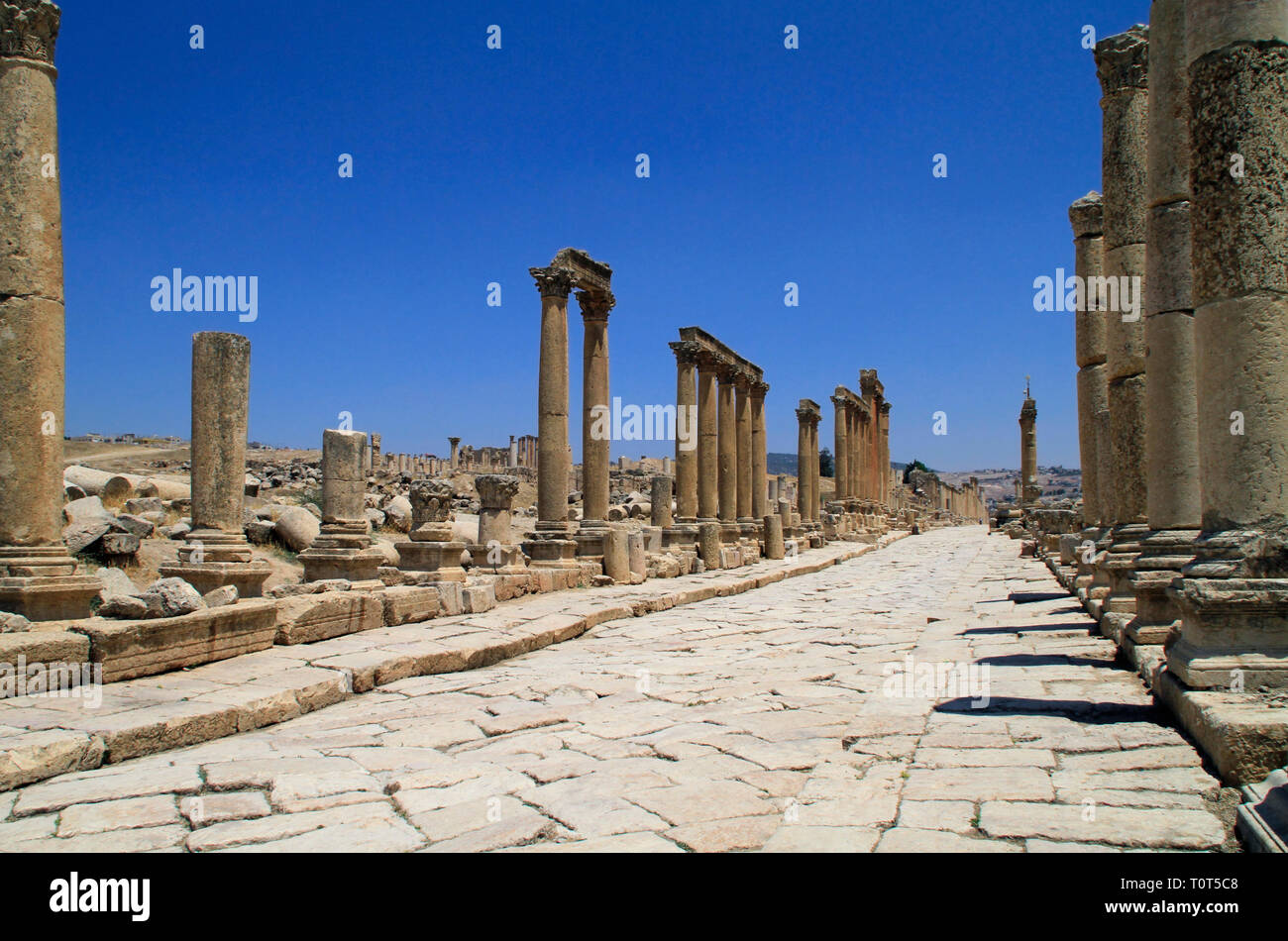 Roman road and ruins: The Jerash ruins of Jordan are said to be the best-preserved Roman ruins outside of Italy Stock Photo