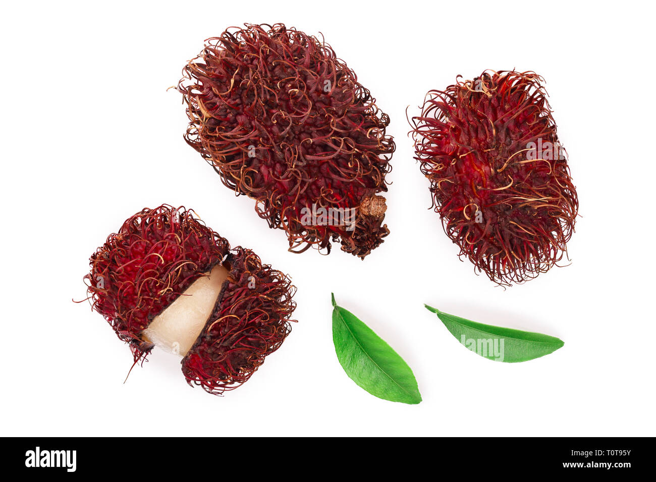 rambutan with leaves isolated on white background. Tropical fruit. Nephelium lappaceum. Top view. Flat lay. Stock Photo