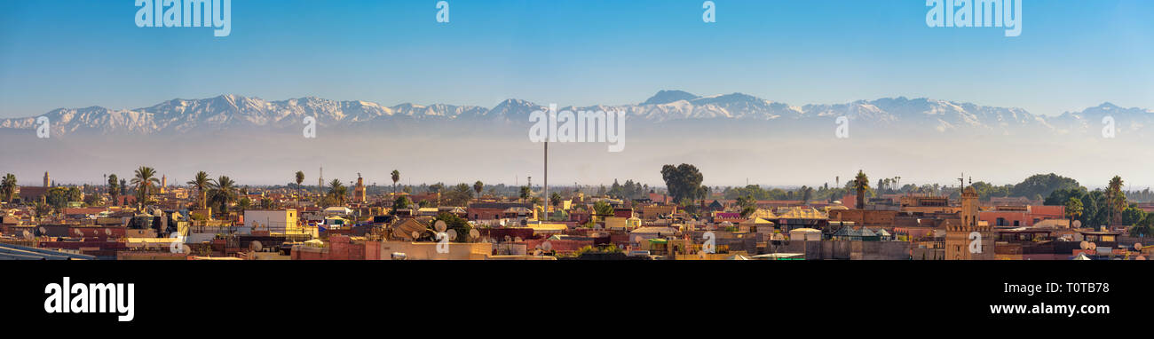 Panorama of Marrakech city skyline with Atlas mountains in the background Stock Photo