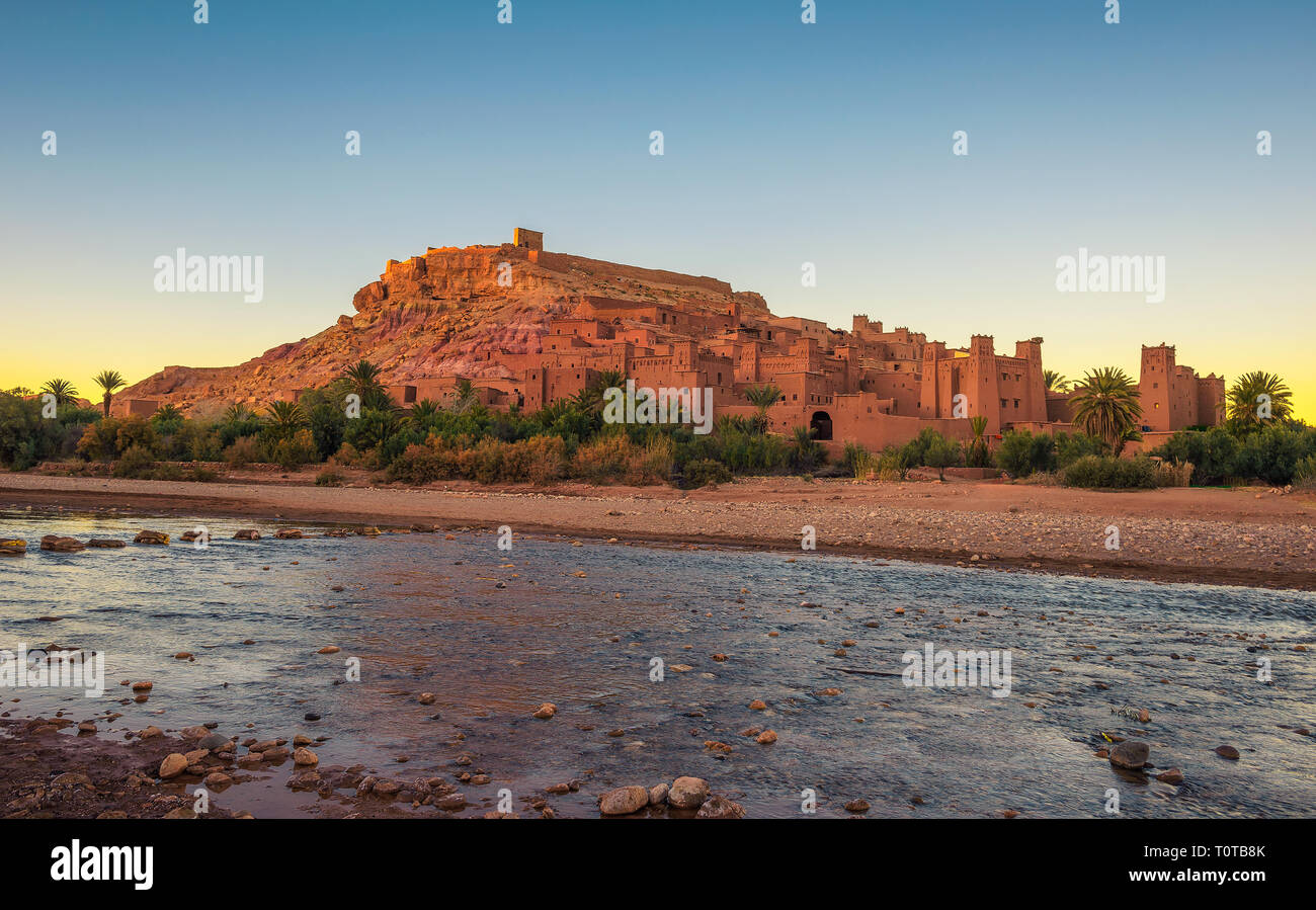 Ait Benhaddou with Asif Ounila river in Morocco at sunset Stock Photo