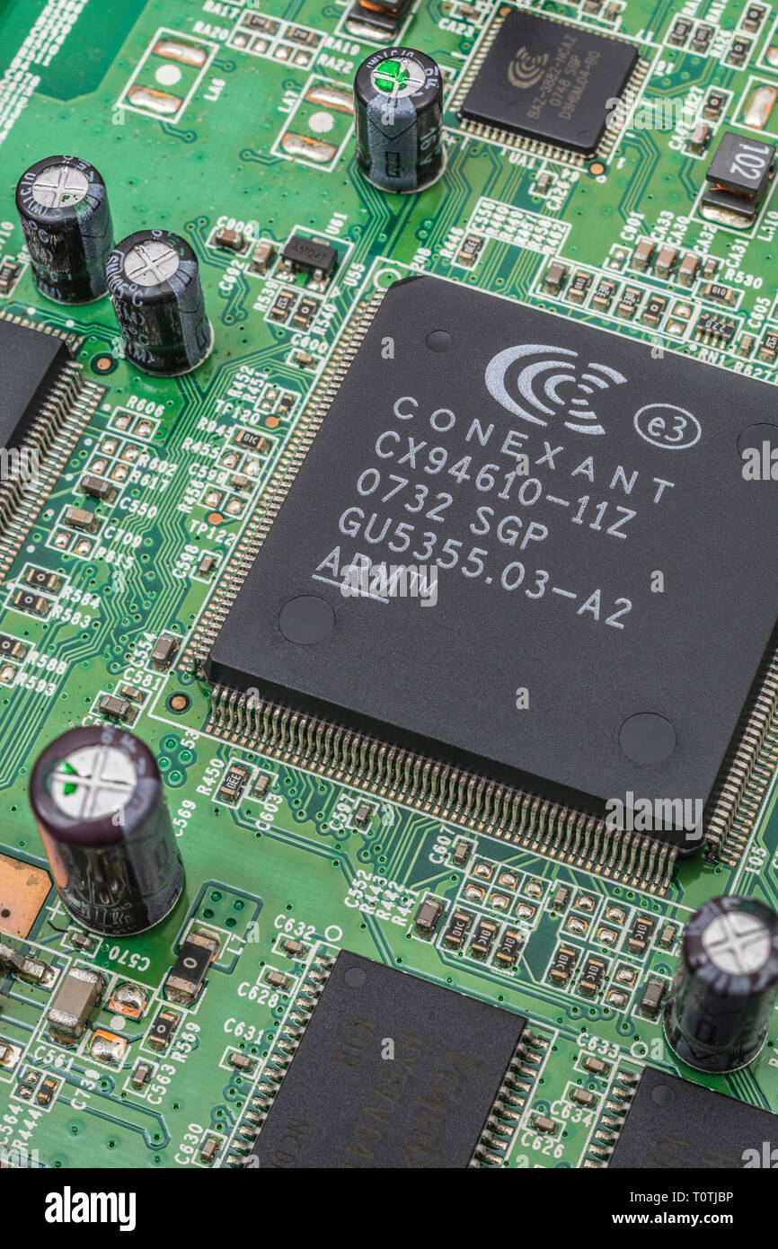 Macro photo Conexant CX94610 chip on Tiscali broadband router. Chip used in  many router brands. Concept connections, broadband, semiconductors Stock  Photo - Alamy