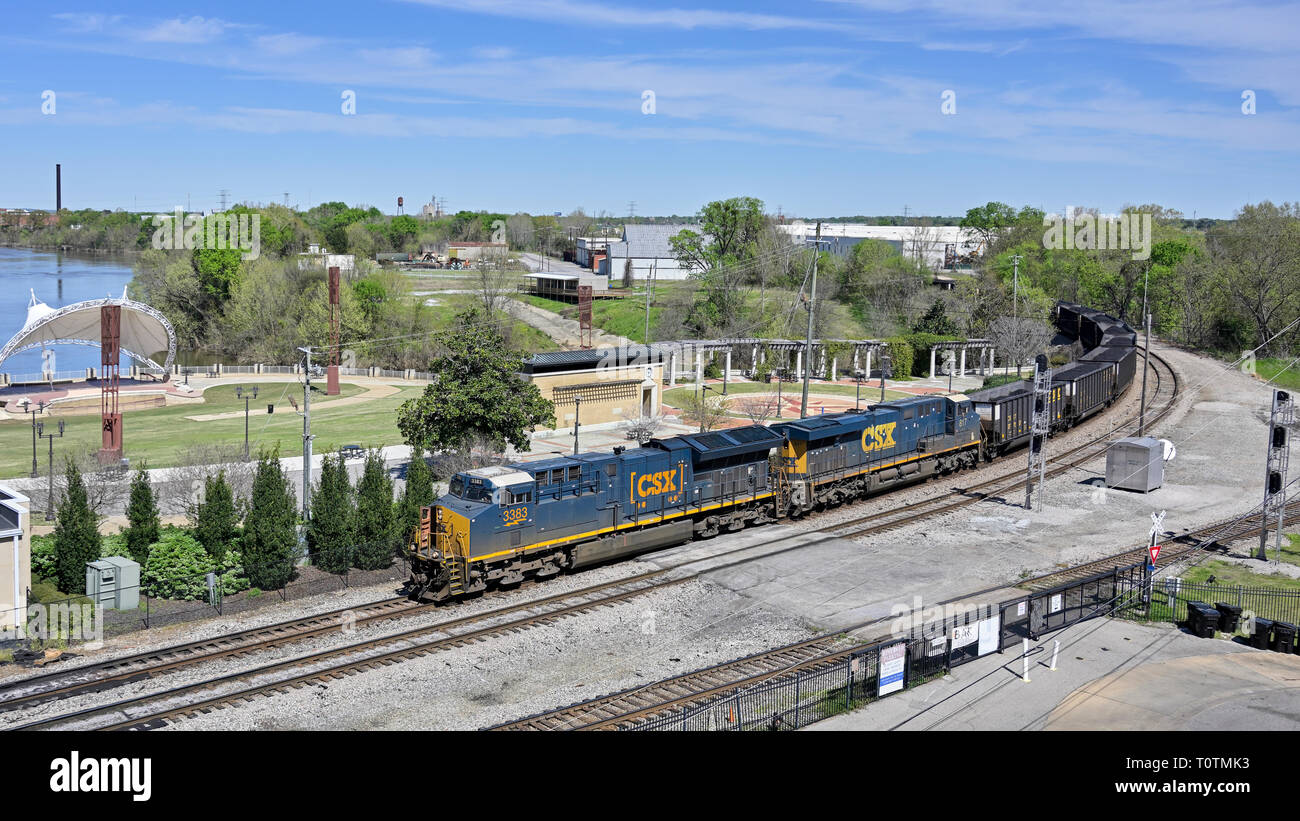 CSX Transportation #3383, an evolution series GE ET44AH diesel electric locomotive, pulling a coal train in Montgomery Alabama, USA. Stock Photo