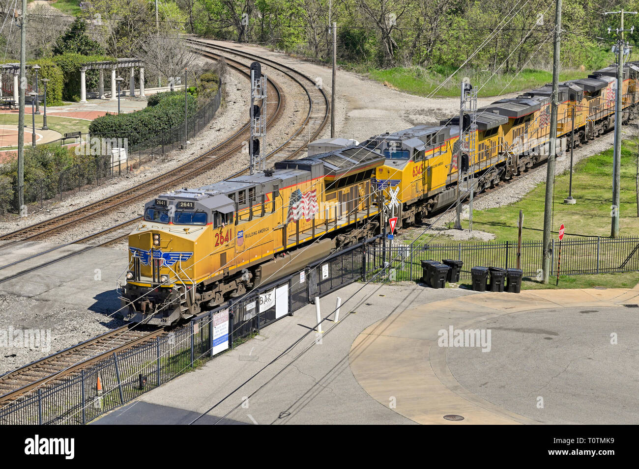 Freight train headed by Union Pacific diesel locomotive #2641, a GE ES44AC, diesel electric engine, in Montgomery Alabama USA. Stock Photo