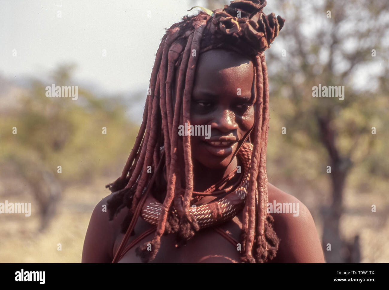 Typical Himba Hairstyle With Braids Intertwined With Mud