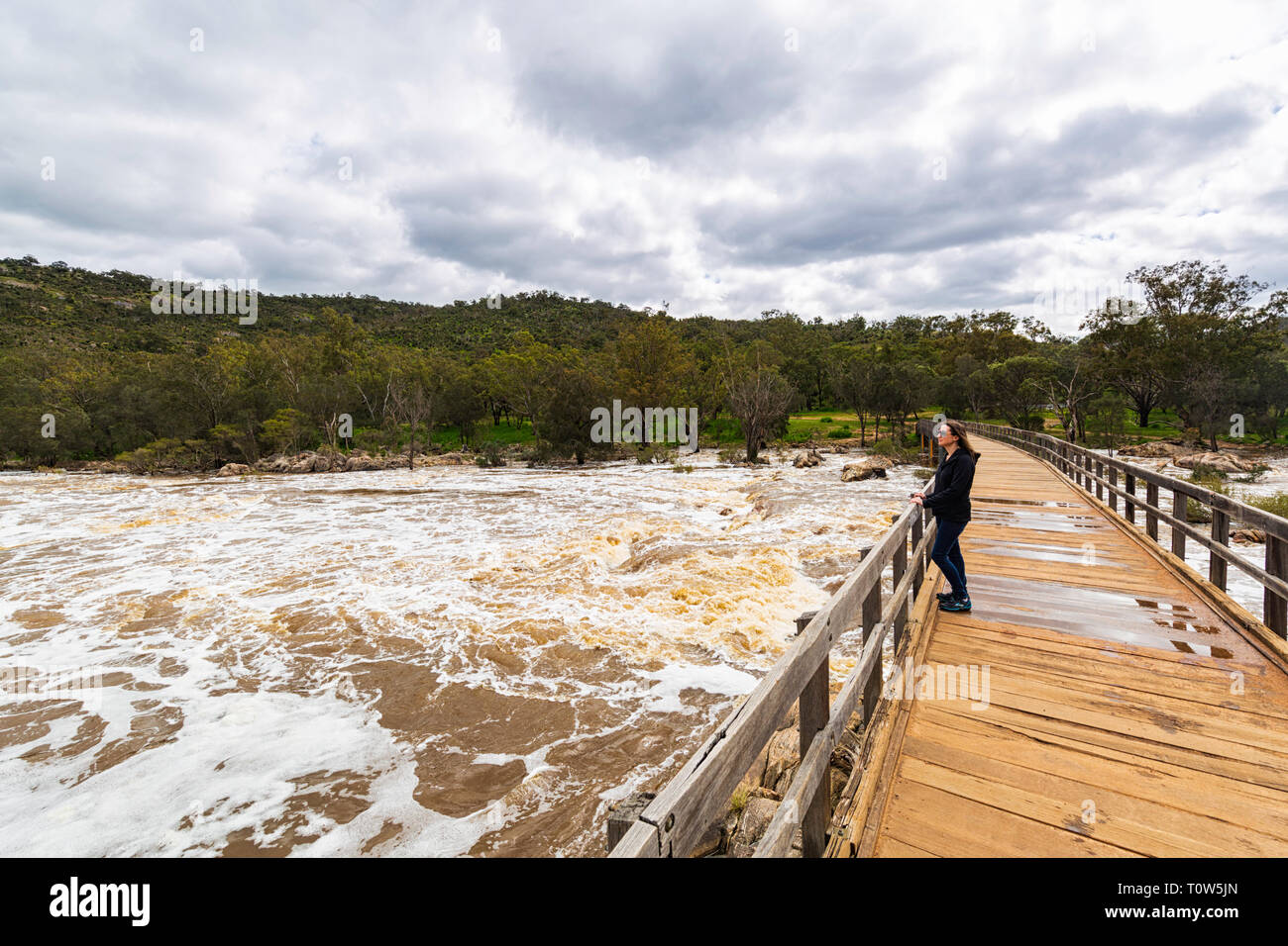 The Swan River in full flow at Bells Rapids after very heavy rain Stock Photo