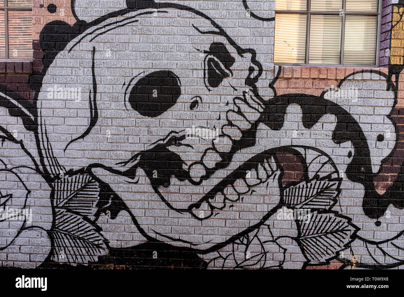 outdoor mural on wall of Blacklist Tattoo Parlour: : Central Ave. Albuquerque, New Mexico Stock Photo