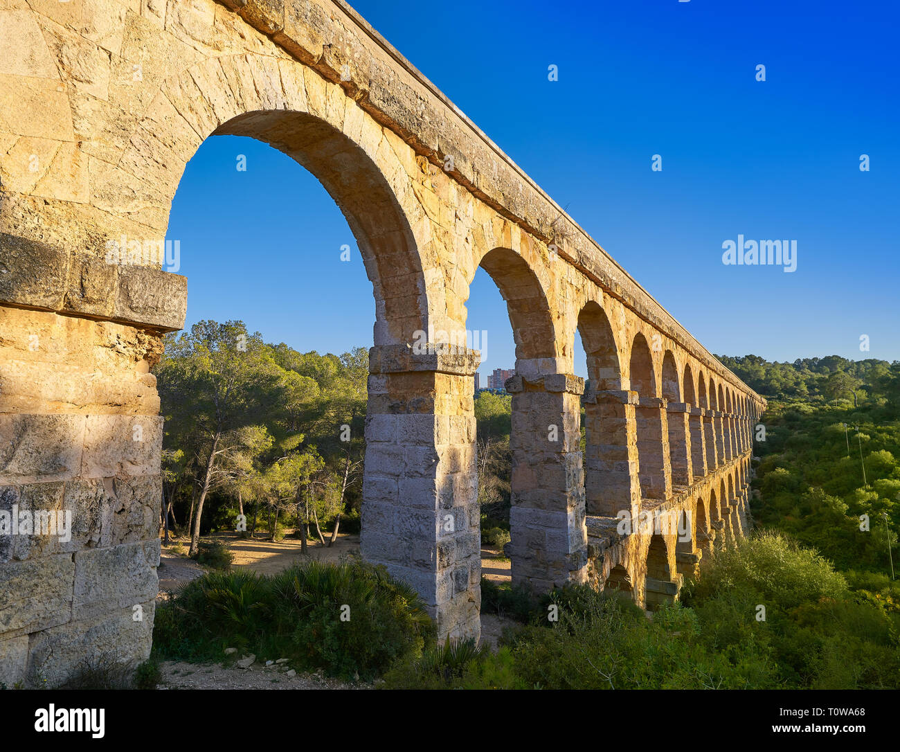 Aqueduct Les Ferreres o Pont del Diable in Tarragona of Catalonia Roman Stock Photo