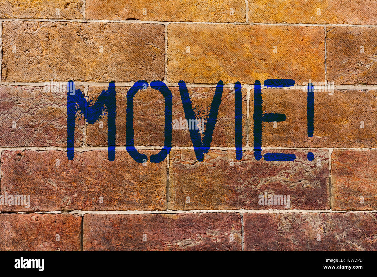 Conceptual hand writing showing Movie Night. Business photo text tells  story and that showing watch on screen or television Brick Wall art like  Graffiti motivational call written on the wall. Stock Photo