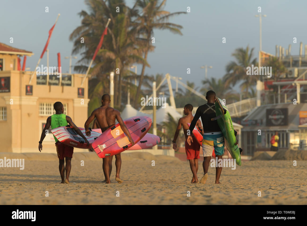 Durban, KwaZuluNatal, South Africa, group of adult men walking on