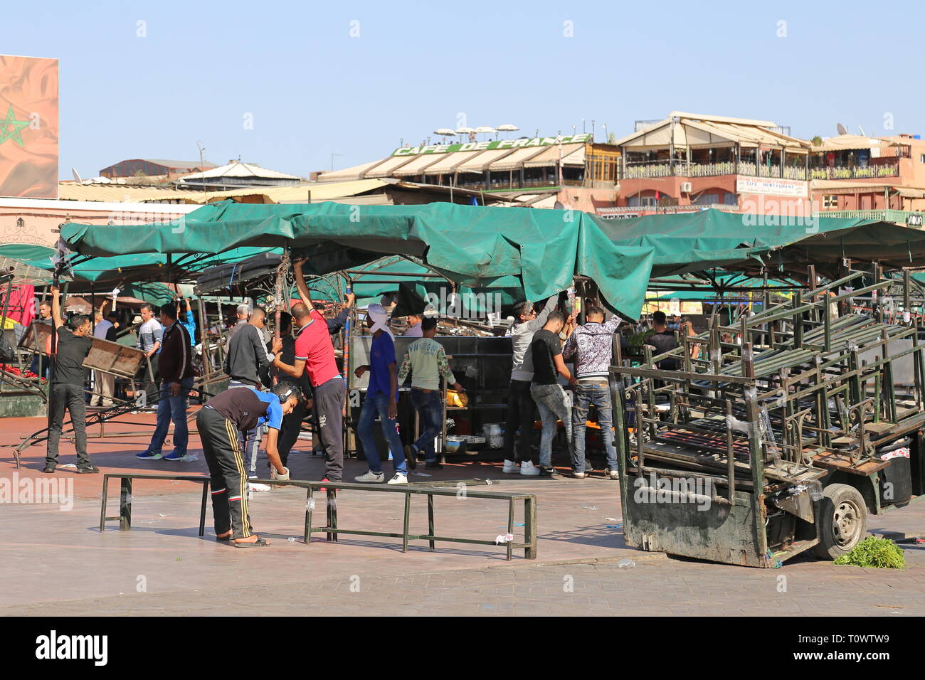 Setting up food stalls for the Night Market at Jemaa el Fna, Medina, Marrakesh, Marrakesh-Safi region, Morocco, north Africa Stock Photo