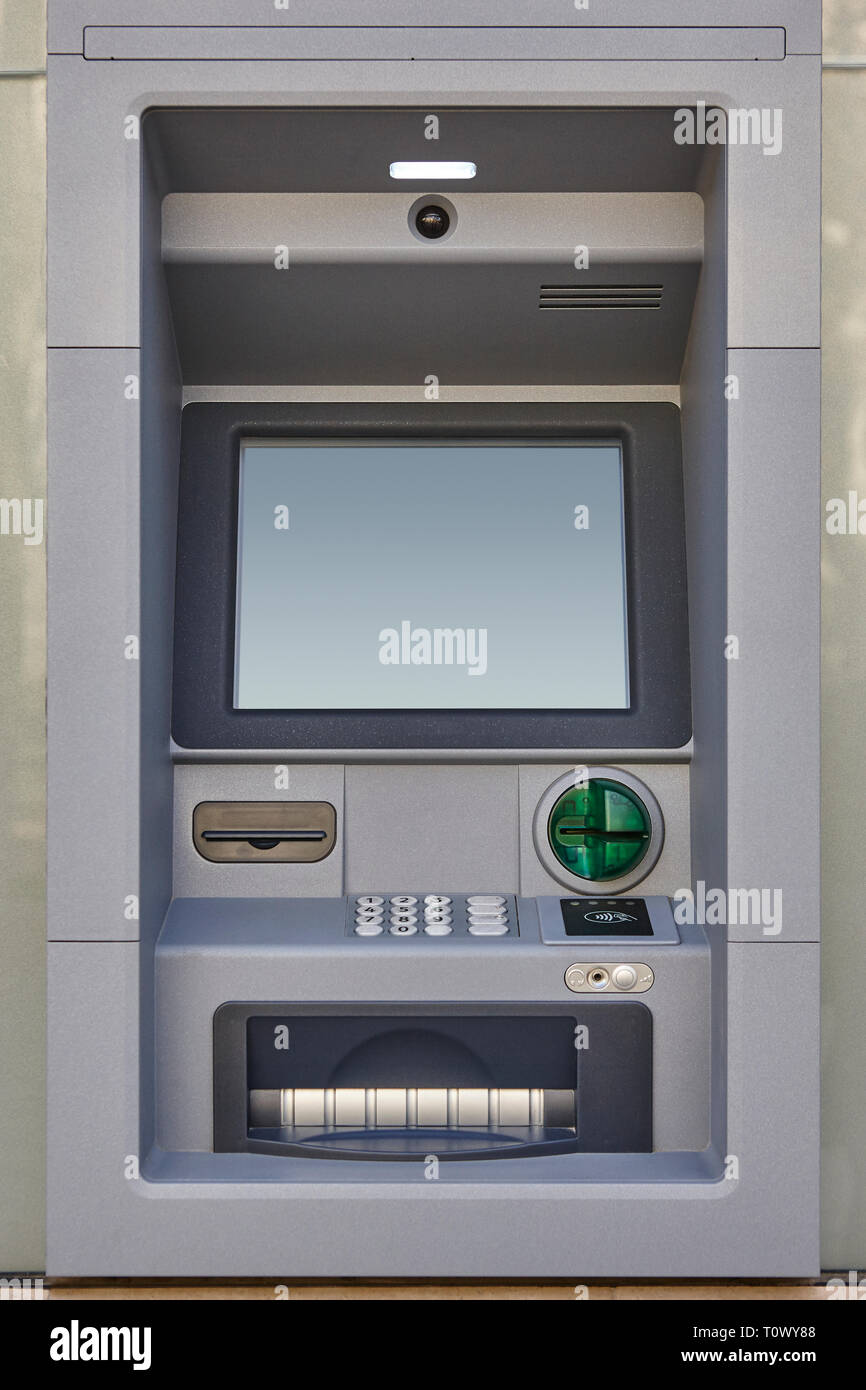 ATM automated teller machine. Banking services and plastic cash money. Stock Photo