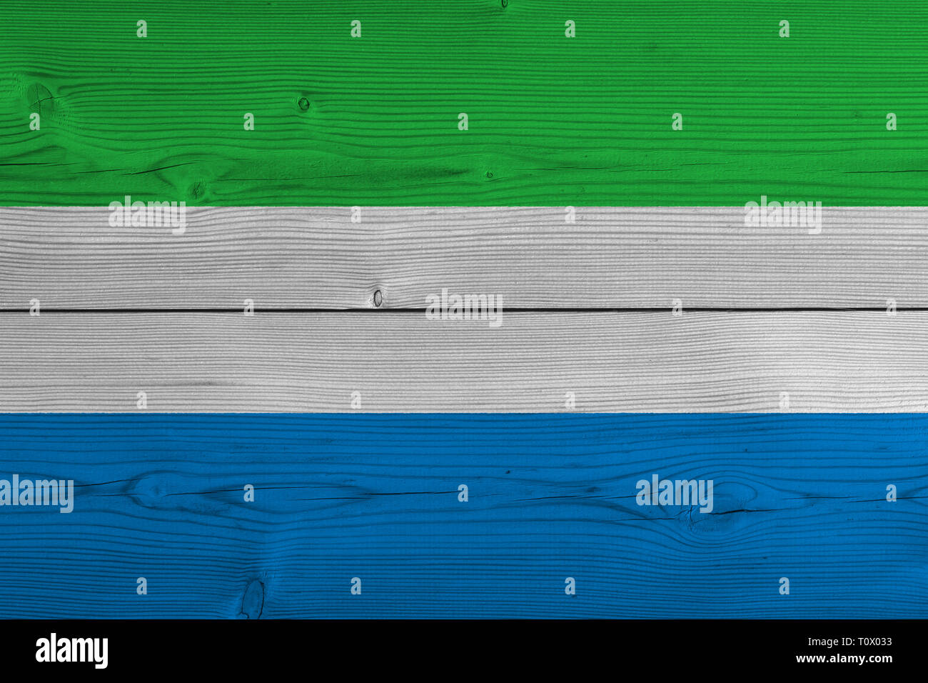 sierra leone flag painted on old wood plank Stock Photo