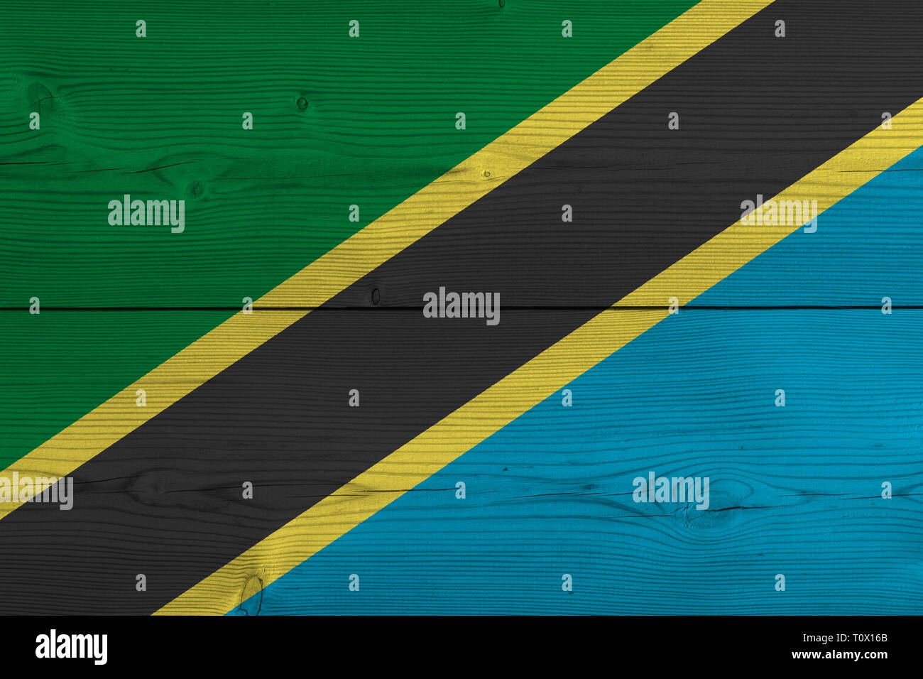 Tanzania flag painted on old wood plank Stock Photo