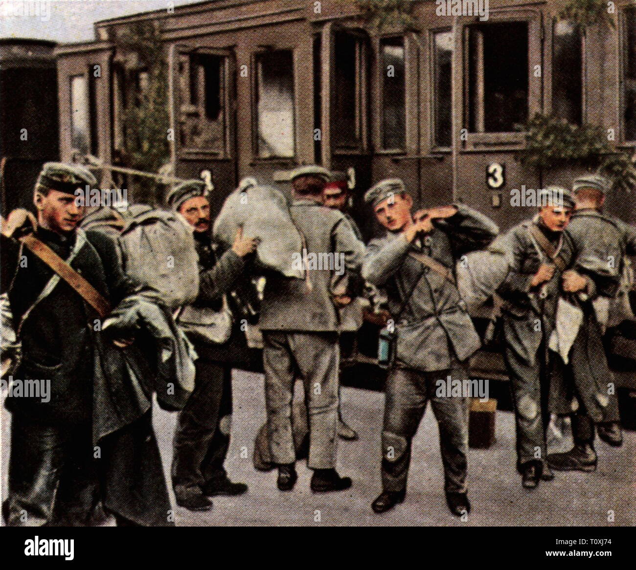 First World War / WWI, prisoners of war, home coming of the first German prisoners of war, 9.9.1919, coloured photograph, cigarette card, series 'Die Nachkriegszeit', 1935, captives, captivity, captivities, captive, comeback, railway, railroad, railways, railroads, transport, soldiers, soldier, repatriates, people, Germany, German Reich, Weimar Republic, 1910s, 20th century, 1930s, world war, world wars, home coming, homecoming, return home, first, 1st, prisoner of war, prisoners of war, coloured, colored, post war period, post-war period, post-w, Additional-Rights-Clearance-Info-Not-Available Stock Photo